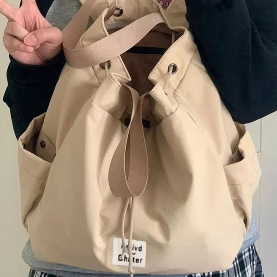 Daily Women’s Bucket Drawstring Backpack + Shoulder Bag — универсальный и стильный помощник для активных дней