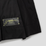 GANNI Duchesse Nylon Pleated Mini Skirt – Black